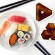 Illustration for article titled Optical Illusions Magically Appear When You Fill These Soy Sauce Dishes
